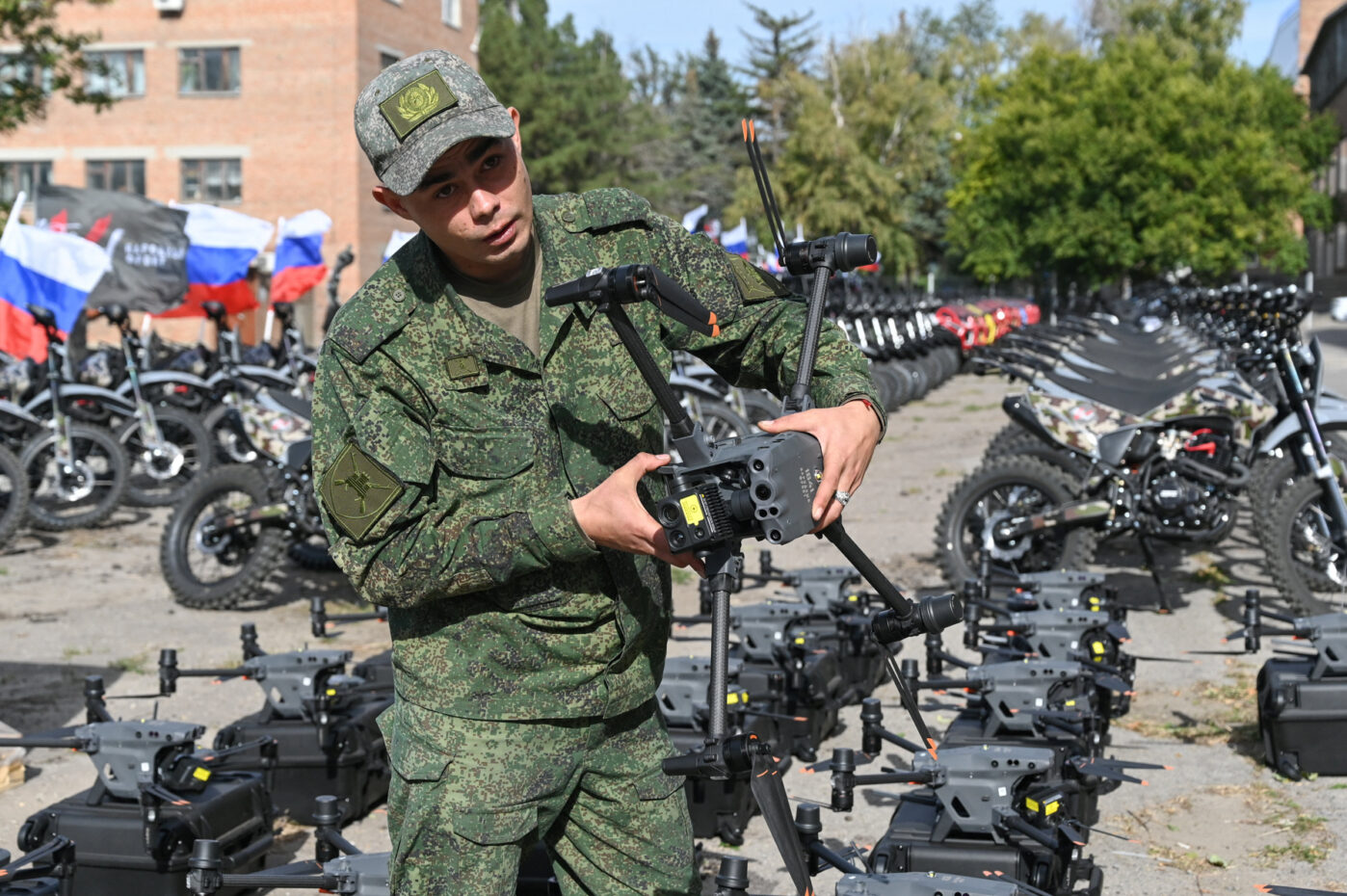 A Russian soldier holds a drone during a ceremony to hand over new equipment for the Russian army to the People’s Front in Rostov-on-Don