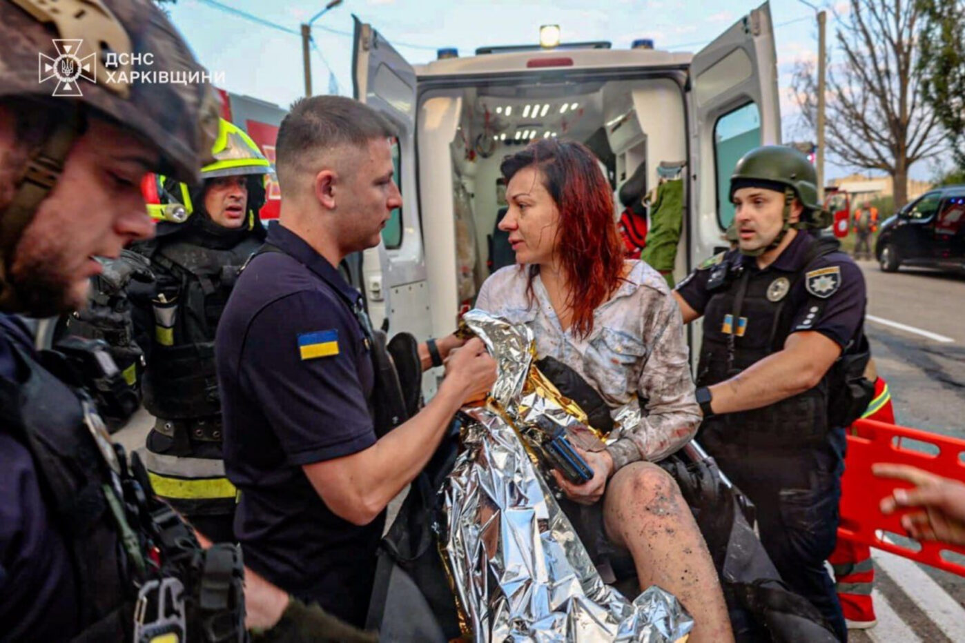 A victim of a Russian drone strike in Kharkiv receives medical assistance