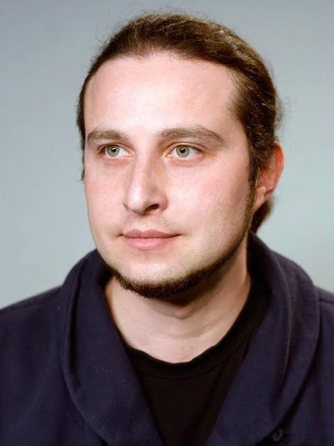 Александр Юнашев